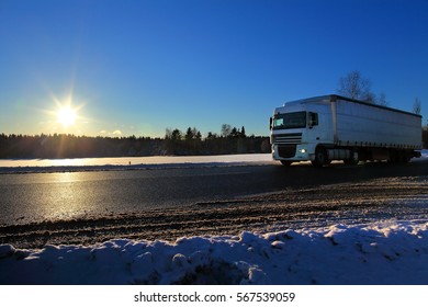 Truck transportation at sunset - Shutterstock ID 567539059