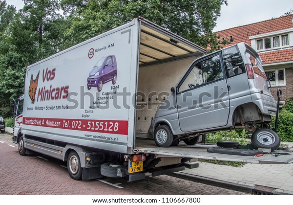 Truck From Vos Minicars Is Repairing\
Mincars At The Spot Amsterdam The Netherlands 2018\
