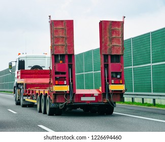 Truck wihout trailer box at the highway asphalt road, Poland. Truck transporter - Shutterstock ID 1226694460