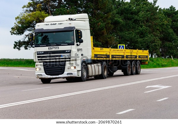 Trucks are carrying cargo. Background with copy
space for text or inscriptions. Illustrative editorial. May 25,
2021 Balti Moldova.