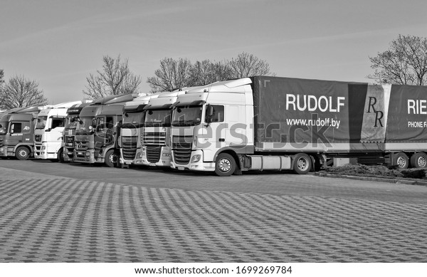 Trucks in East Europe. Transport. Long vehicles.
Black and White Photography. Poland, Horbov-Kolonia - April 16,
2018