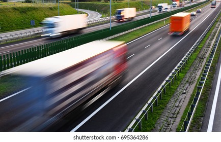 Trucks on four lane controlled-access highway in Poland.
