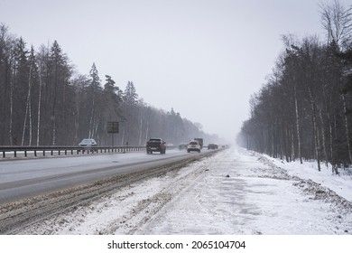 Trucks On The Highway In Dirty Weather, Dangerous Driving Conditions In Winter In Cloudy Weather. Challenging Winter Weather Driving Conditions. Dirt On The Highway, Transportation Of Goods In Bad