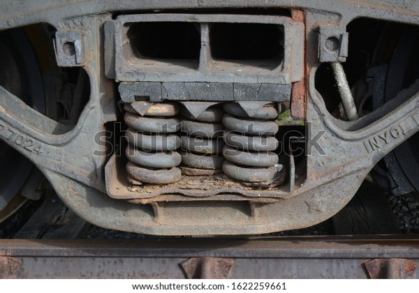 trucks on a train\
car that has been\
abandoned