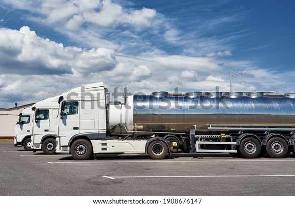 Trucks with tank\
trailer on the parking\
lot