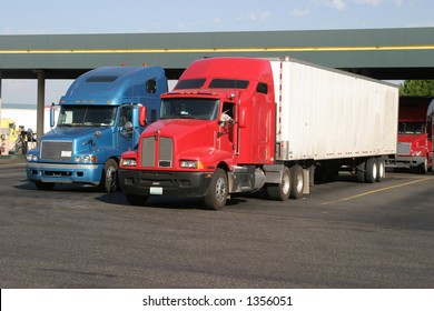 Trucks At A Truckstop Fueling Station