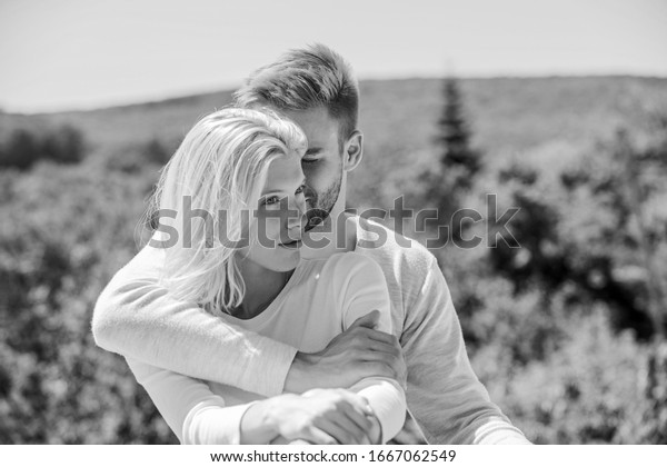 True love. Tenderness concept. Enjoy every\
moment. Peaceful romantic people. Enjoyment. Summer romance. Family\
love. Love story. Romantic relations. Couple in love. Man and woman\
sunny day outdoors.
