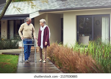 True Love Is Timeless. Shot Of A Loving Senior Couple Taking A Walk Outside.