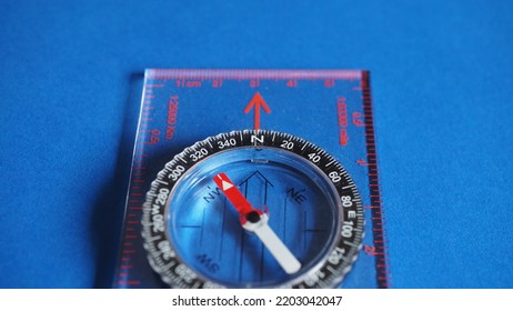 True North Compass Blue Background