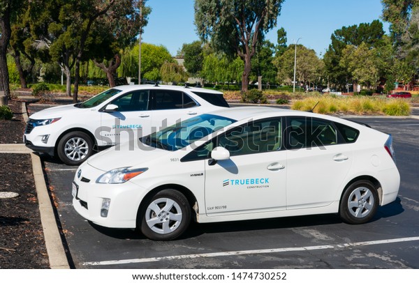 Truebeck\
Construction service cars on outdoor parking lot - Foster City,\
California, USA - Circa August,\
2019