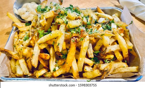 Truffle Fries Truffled French Fry on Tray with Herbs and Parmesan Cheese