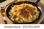 Truffle Mac and Cheese: Creamy macaroni and cheese, enriched with decadent truffle oil, featuring a blend of sharp cheddar and Gruyère cheeses, topped with a crunchy, golden breadcrumb crust.