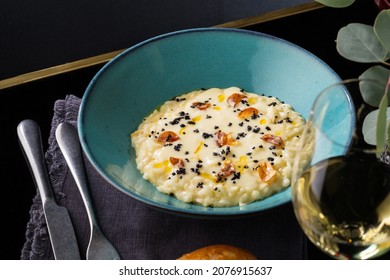 Truffle Risotto And Glass Of White Wine