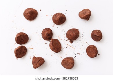 Truffles pattern, top view flat lay of various chocolate sweets. Minimal concept above decoration on white food background. Chocolate Candy, Truffle.