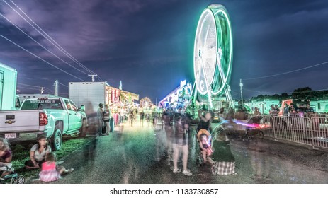 Trumbull County, Ohio/USA - July 10, 2018: Ferris Wheel Spinning At The County Fair