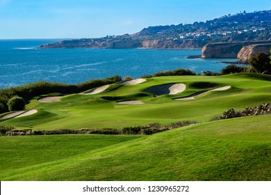 The Trump National Golf Course, in Rancho Palos Verdes along the Pacific coast of California, opened in 2006. Fairway and greens with lakes, sand traps are seen, ocean background with cliffs, bluffs.