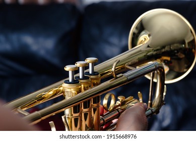 Trumpet. Close up of a trumpet, blurred background  