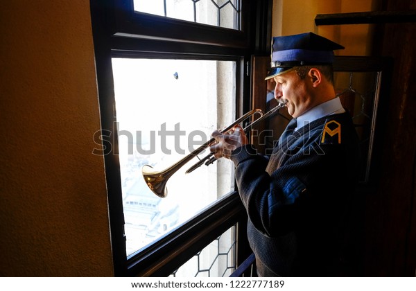The trumpeter in the St. Mary's Basilica performs the Mariacki Hejnal. Is a traditional, five-note Polish anthem closely bound to the history and traditions of Krakow. KRAKOW, POLAND. 10-12-2015