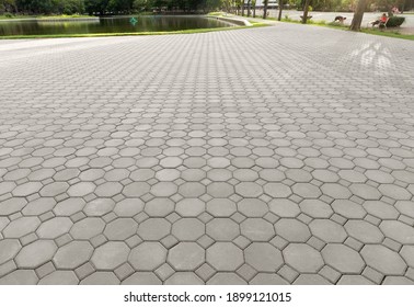 Truncated square tiling pattern of paver brick floor or block paving. Construction or lay on ground at outdoor for road, street, pavement, sidewalk, floor, path, footpath, walkway, patio or background