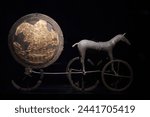 The Trundholm sun chariot (Danish: Solvognen) is a Nordic Bronze Age artifact discovered in Denmark from about 1400 BC. Today it can be seen on the Danish national museum in Copenhagen. 