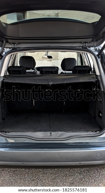 The trunk of a car. open trunk. Third row seat of \
of universal car.
