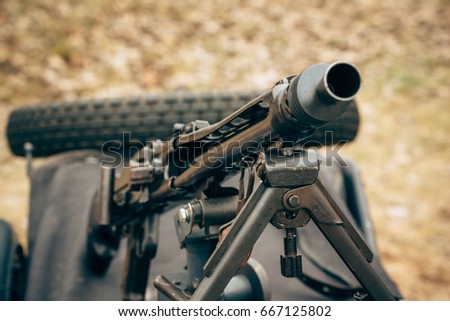 The trunk of the machine gun of German troops of the Second World War close-up