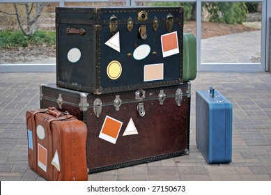 Trunk And Suitcases With Travel Stickers