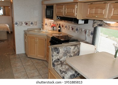 Truro England. Interior of a large ARV or recreational vehicle showing the kitchen area with cupboards and stove.