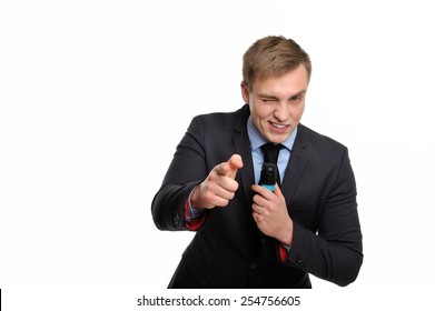 Trust me, you can do it!  Attractive man with a microphone is delivering a motivating speech.   - Powered by Shutterstock