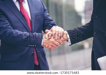 Trust Promise Concept. Honest Lawyer Partner with Professional Team make Law Business Agreement after Complete Deal. Ethics Business people handshake, touch and Respect customer to trust partnership.