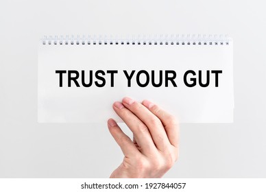 Trust your gut inscription. Follow instincts concept. - Shutterstock ID 1927844057