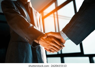 Trusted partner. Businessmen making handshake with partner, greeting, dealing, merger and acquisition, business cooperation concept, joint venture, Build trust in business and finance relationships.