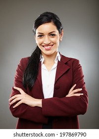 Trustworthy Latino Business Woman Smiling With Confidence