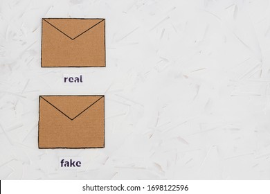 Trust-wrothy Vs Fake Emails Or Online Scams Concept, Email Envelop Icons With Real Vs Fake Labels On Them