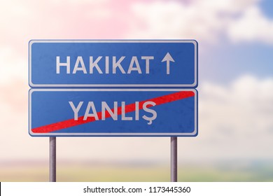 truth and false - blue road sign with inscriptions in Turkish