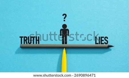 Truth vs lie are shown using a text as media literacy concept. Fake news detection and critical thinking