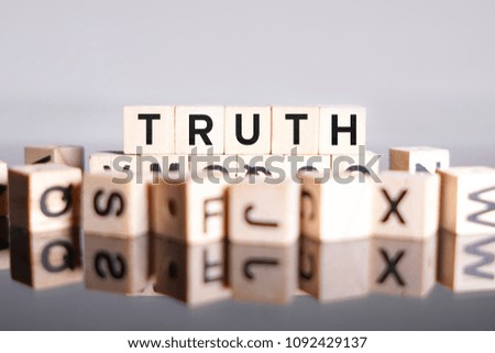 Truth word cube on reflection