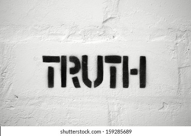 Truth Word Stencil Print On The White Brick Wall