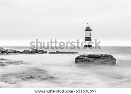 Trwyn Du or Penmon Lighthouse between Dinmor Point near Penmon and Ynys Seriol, or Puffin Island, at the eastern extremity of Anglesey North Wales. 