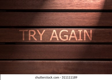 Try Again Text On Wooden