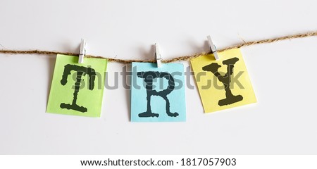 TRY concept - colorful sticky notes with word seo on the white background