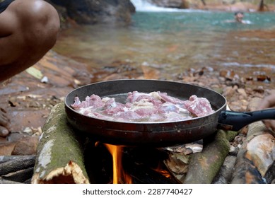 I'm try to cooking in the river