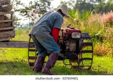Try starting the engine himself, farmers use this dragging and collecting the rice cottons.