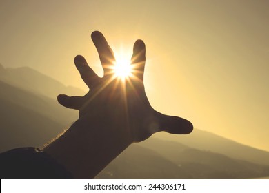 Trying to grab the sun