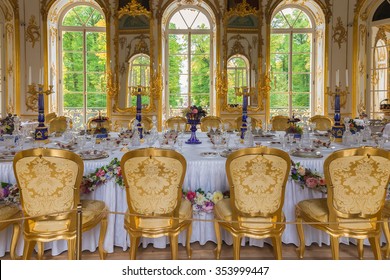 TSARSKOYE SELO (PUSHKIN), RUSSIA - SEPTEMBER 28, 2012: Interior of Hermitage pavilion in the Catherine Park of Tsarskoye Selo with its famous dining mechanical table, Baroque style