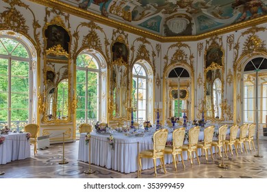 TSARSKOYE SELO (PUSHKIN), RUSSIA - SEPTEMBER 28, 2012: Interior of Hermitage pavilion in the Catherine Park of Tsarskoye Selo with its famous dining mechanical table, Baroque style (1744-1754)