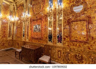 Tsarskoye Selo (Pushkin), Saint Petersburg, Russia - 28 November, 2019:  Baroque golden interior of The Catherine Palace, located in the town of Tsarskoe selo. Russian residence of Romanov Tsars