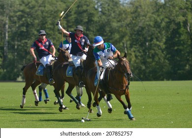 TSELEEVO, MOSCOW REGION, RUSSIA - JULY 26, 2014: Match British Schools - Moscow Polo Club during the British Polo Day. Moscow Polo Club won 7-6