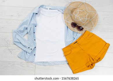 Tshirt Mock Up Top View On Wooden Floor, Clothes Background Copy Space Shirt Flatlay