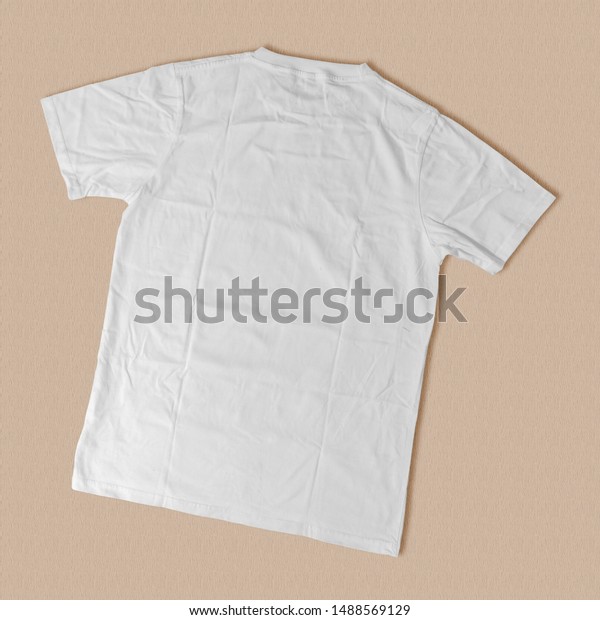 Download Tshirt Mockup Back Side On Desk Stock Photo Edit Now 1488569129
